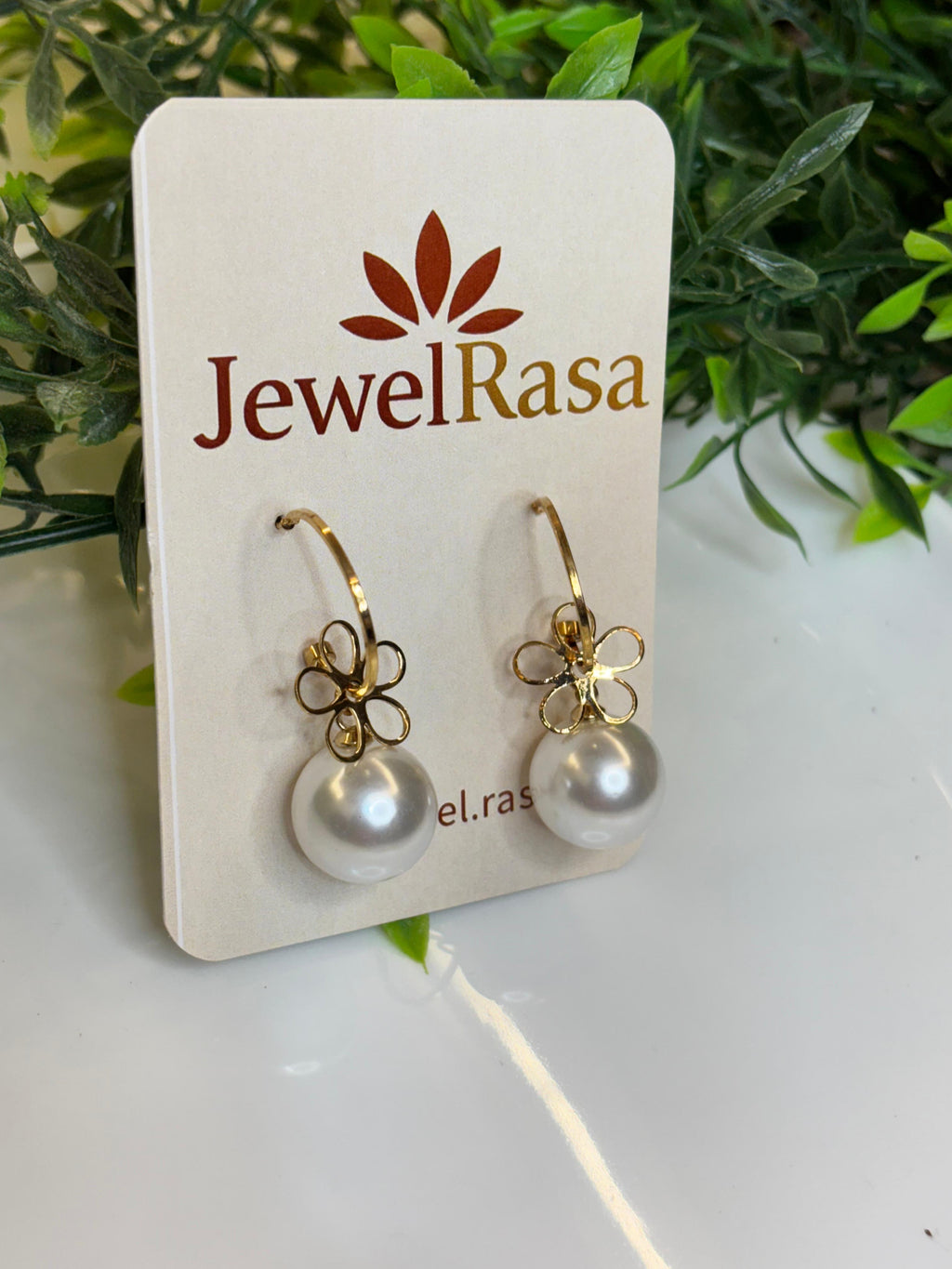 Elegant floral pearl drop earrings